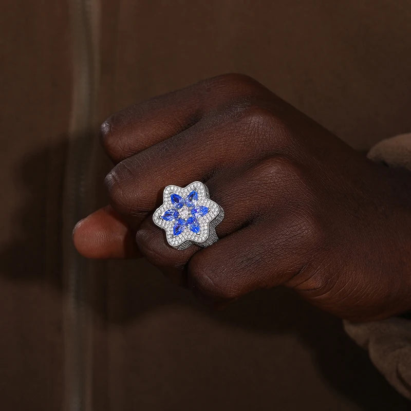 Bold star ring in sterling silver, set with moissanite and pave diamonds.