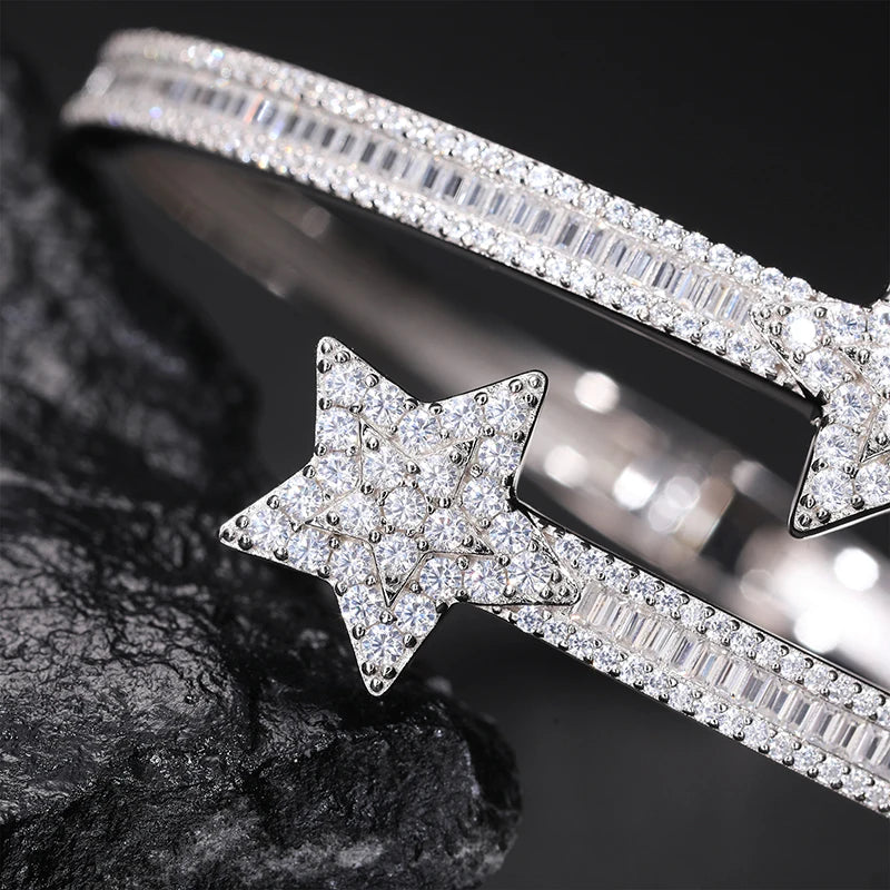 Chic star bangle: moissanite and diamonds sparkle in sterling silver setting.