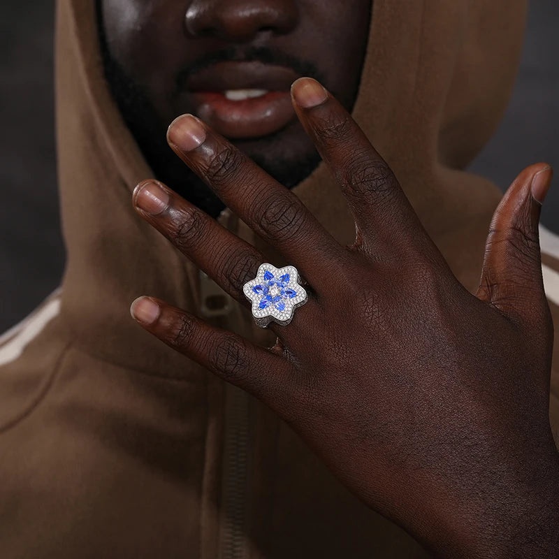 Bold star ring in sterling silver, set with moissanite and pave diamonds.