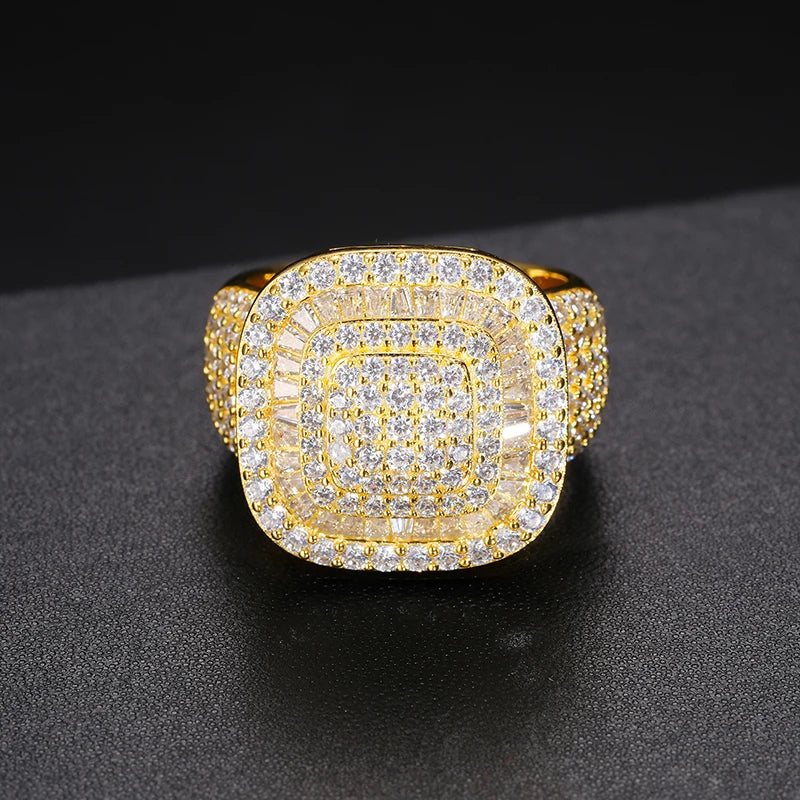 Bold sterling silver ring, gold plated, showcasing a brilliant square moissanite centerpiece.