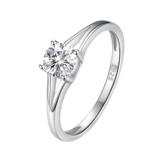 Sparkling moissanite solitaire ring in sleek sterling silver setting. Elegant and modern design.