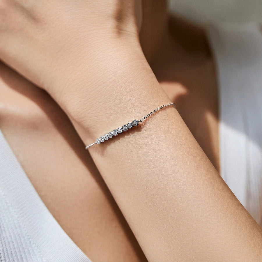 Radiant moissanite bracelet, a touch of sparkle in sterling silver.