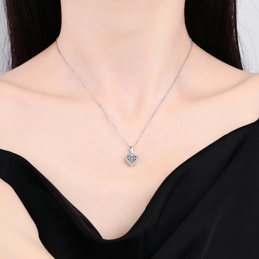 Dazzling moissanite heart necklace, classic silver design.