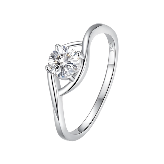 Sparkling moissanite ring, iris-shaped stone, sterling silver band, elegant design.