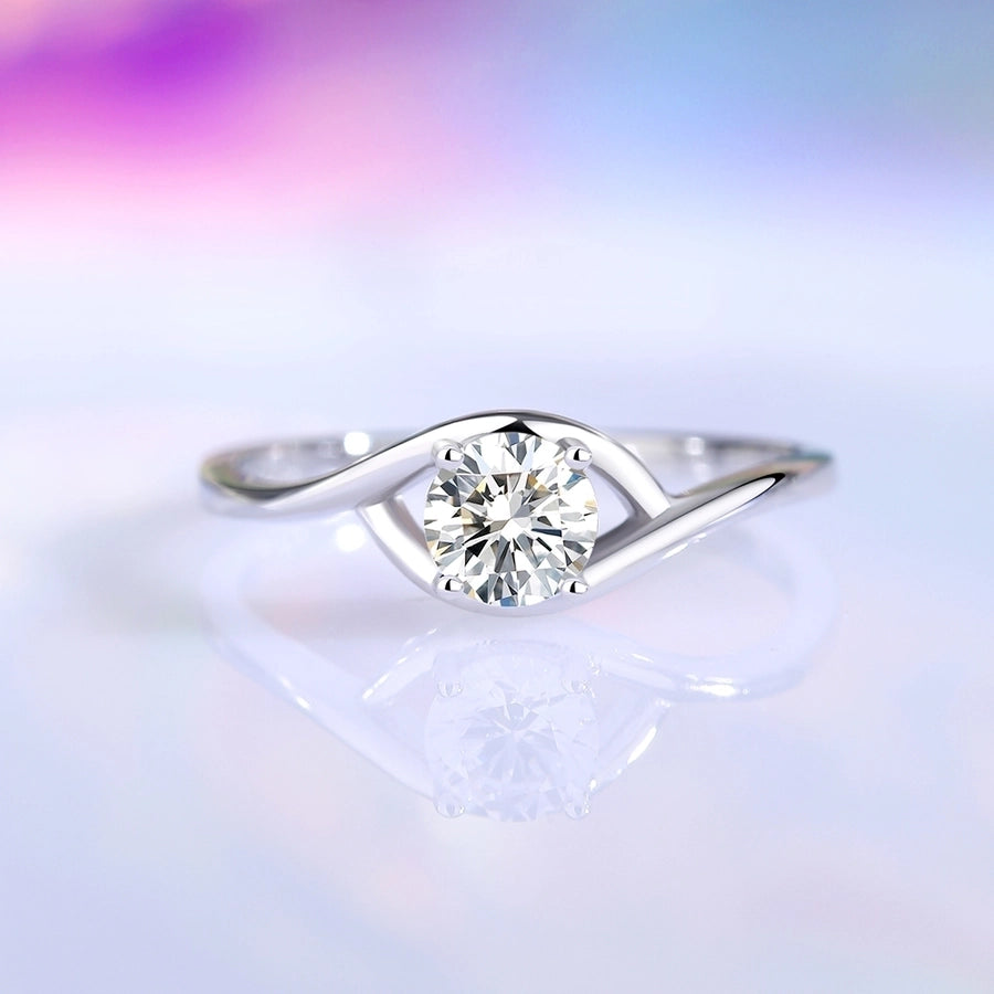 Sparkling moissanite ring in sterling silver, featuring an unique iris-inspired design.