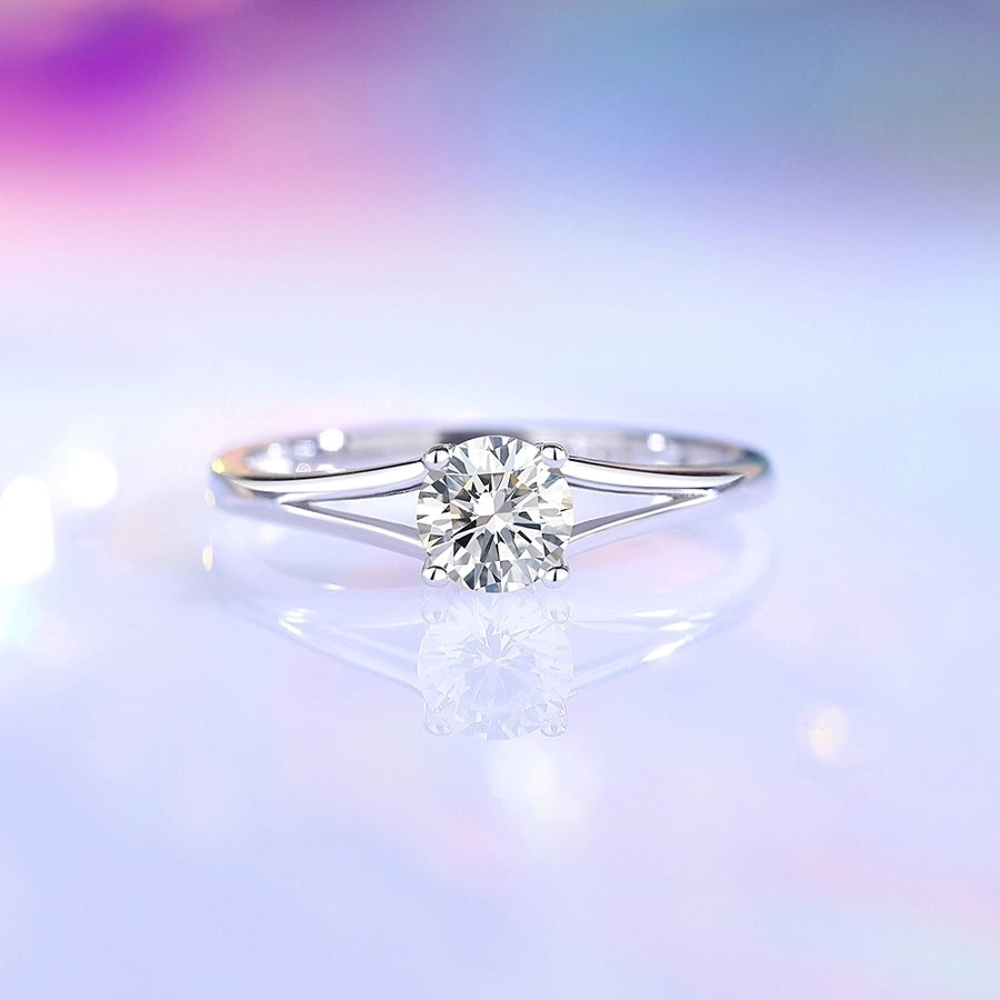 Sparkling moissanite solitaire ring in sleek sterling silver setting.