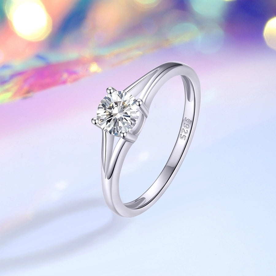 Sparkling moissanite solitaire ring in sleek sterling silver setting. Elegant and timeless design.