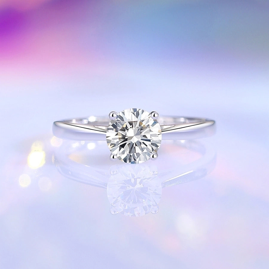 Brilliant moissanite ring, simple and elegant sterling silver band.