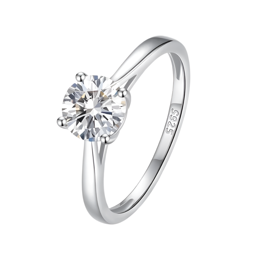 Sparkling moissanite solitaire ring in sleek sterling silver setting. Classic, elegant design.