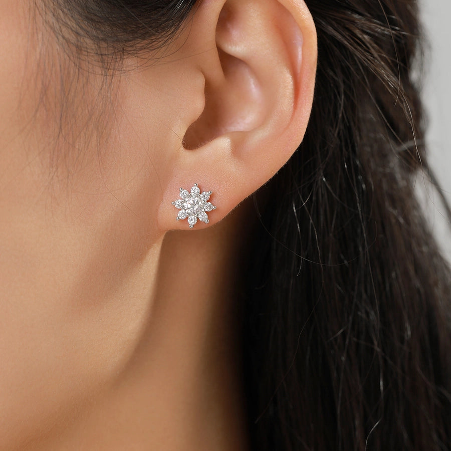 Dazzling flower earrings: moissanite and diamonds, silver setting.