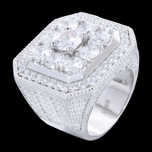 Sterling silver men's ring with large moissanite center stone and diamond accents.